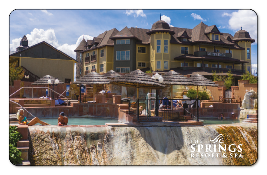 The Spring resort and spa logo over image of building outside during day time